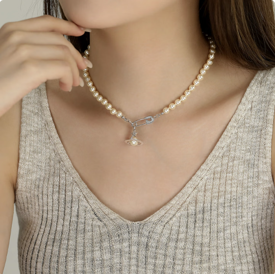 041 Vivienne Westwood Pearl Necklace , Zircon meteorite pendant pin design